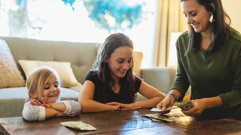 Set the tone early when teaching kids about money